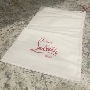 White Christian Louboutin dust bag
